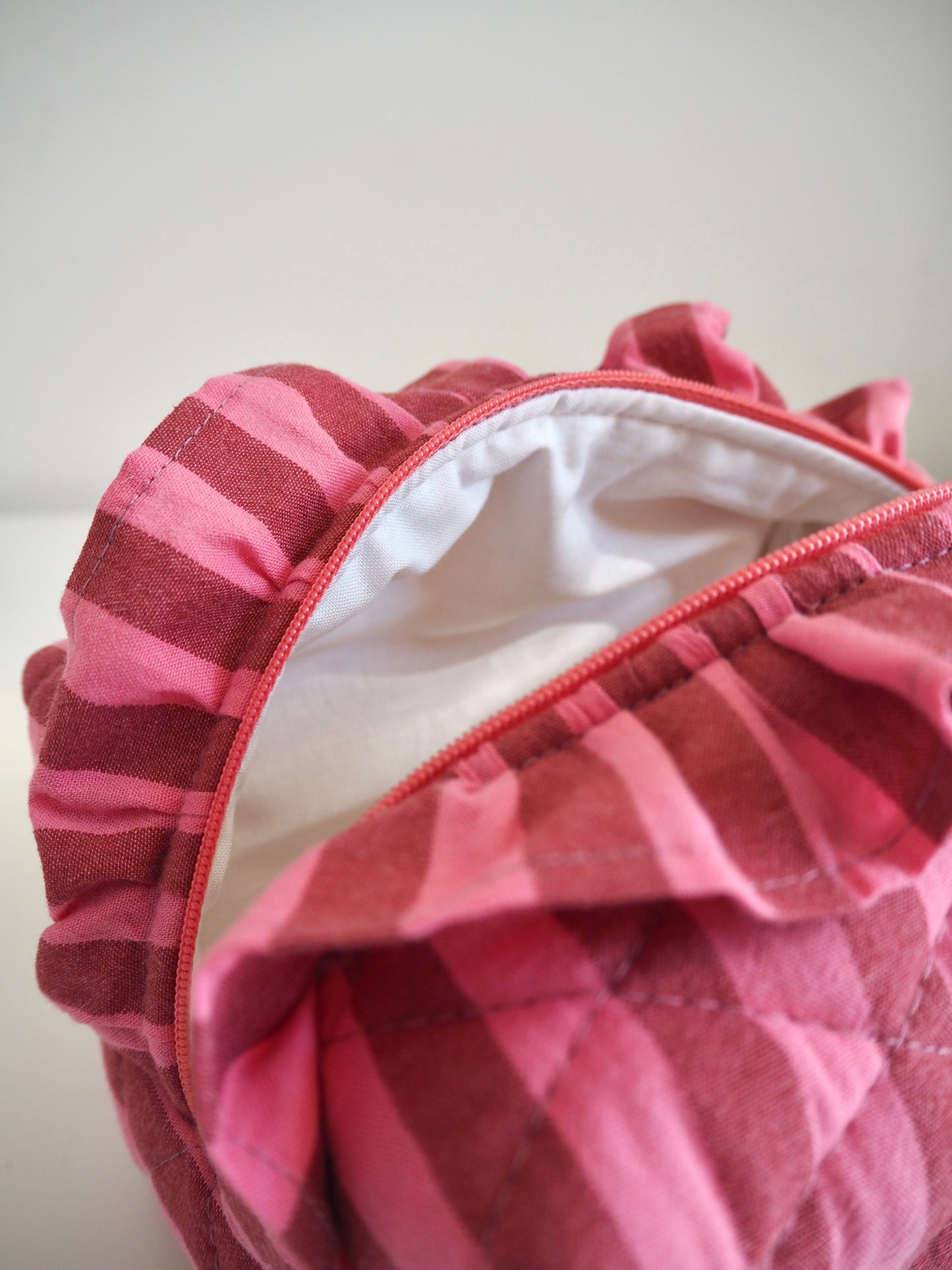 PINK & BROWN STRIPE FRILL QUILTED MAKEUP BAG