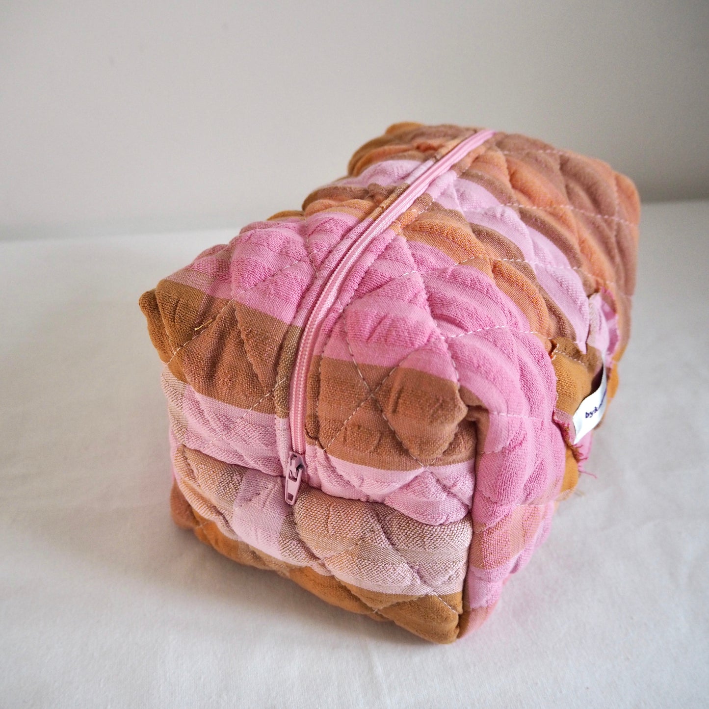 UP-CYCLED PINK AND ORANGE SEERSUCKER QUILTED MAKEUP BAG