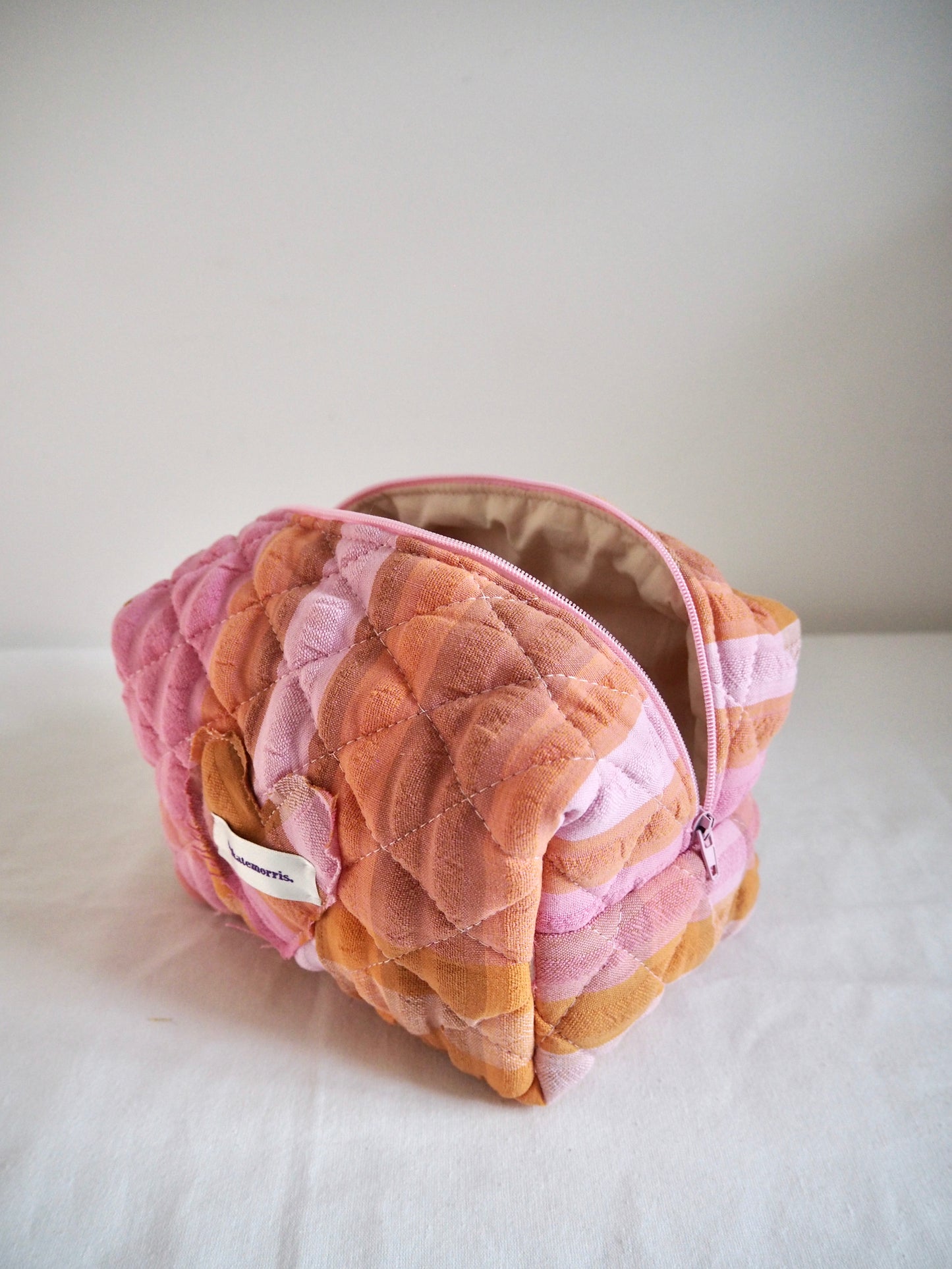 UP-CYCLED PINK AND ORANGE SEERSUCKER QUILTED MAKEUP BAG