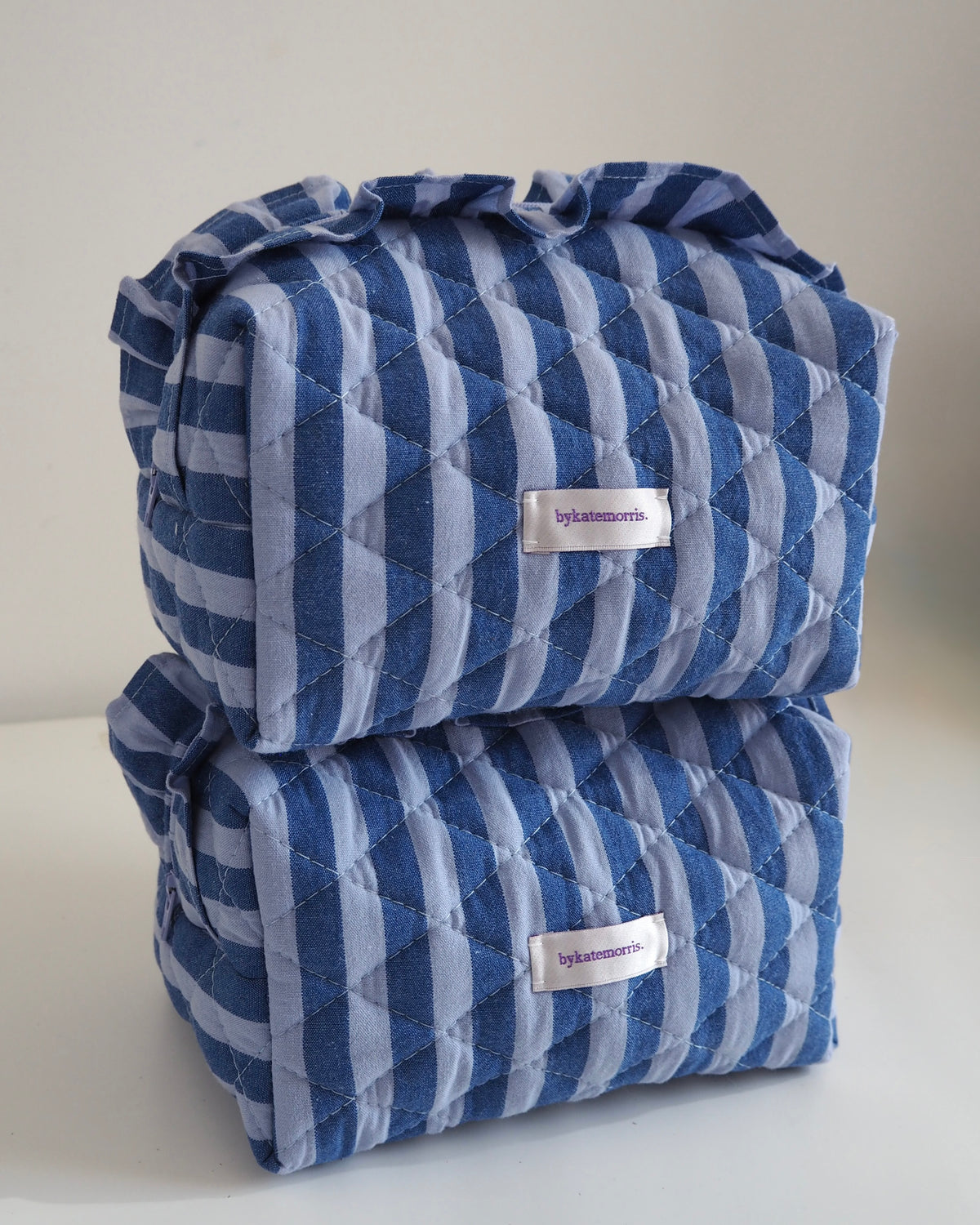 BLUE STRIPE FRILL QUILTED MAKEUP BAG